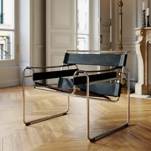 A black leather and chrome-plated steel Wassily chair sits in the corner of a Parisian apartment's living room. The chair's distinctive tubular frame and geometric design are highlighted against cream-colored walls with ornate crown molding. Tall windows with white curtains allow natural light to illuminate the space, while herringbone wooden flooring extends across the room. A portion of an antique brass floor lamp and carved marble fireplace mantel are visible in the background.  Interior design photography with soft natural lighting and sharp focus on architectural details against neutral surfaces.
